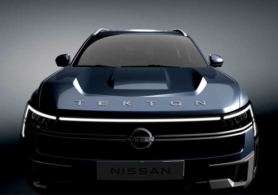 Front view of a dark blue Nissan Tekton concept SUV with prominent LED headlights and Nissan emblem on the grille (front center).