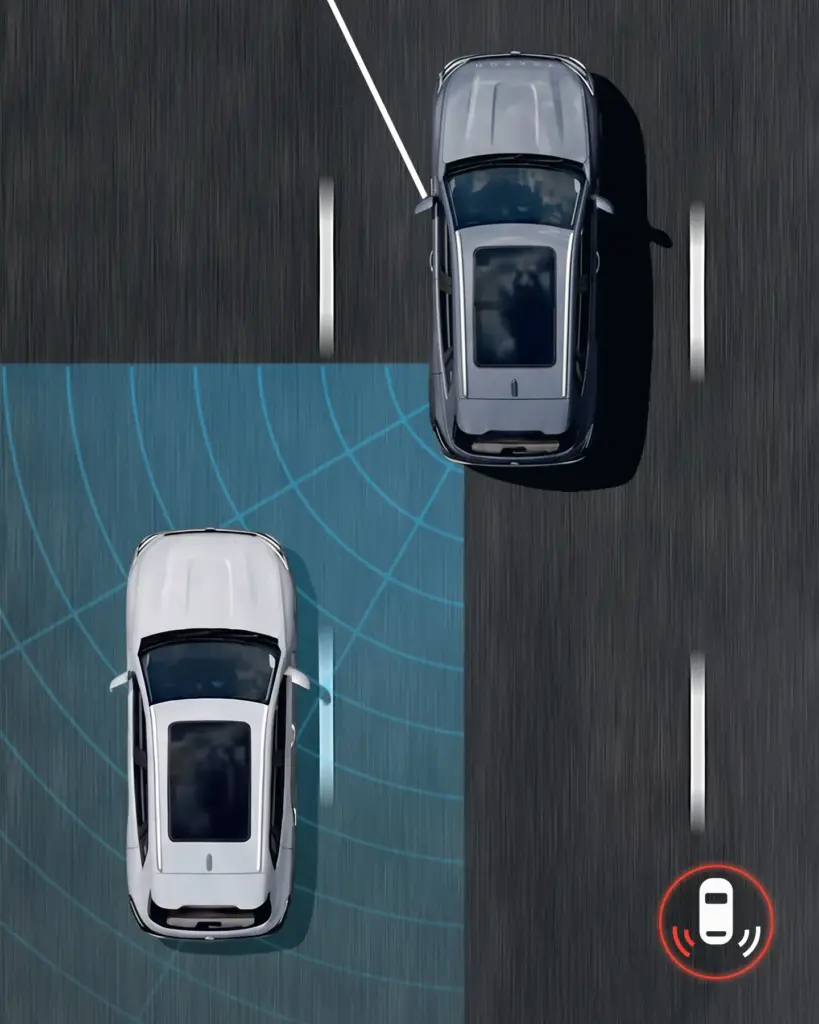 Top-down view of three cars on a roadway, with a blue sensor field showing the autonomous perception area around the left car and a red alert icon at the bottom-right corner.